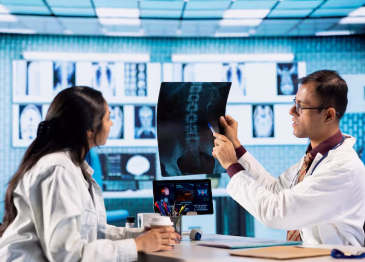 indian-expert-explaining-diagnostics-through-test-results-with-male-patient_482257-108258